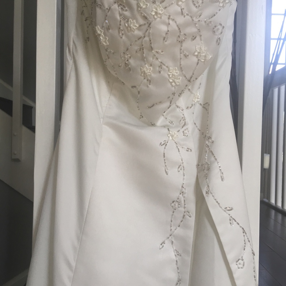 Ivory strapless wedding gown